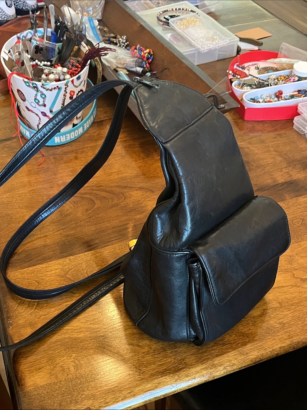 Tignanello Black Leather Bag with Gold Logo Tag Sling/Backpack Bag